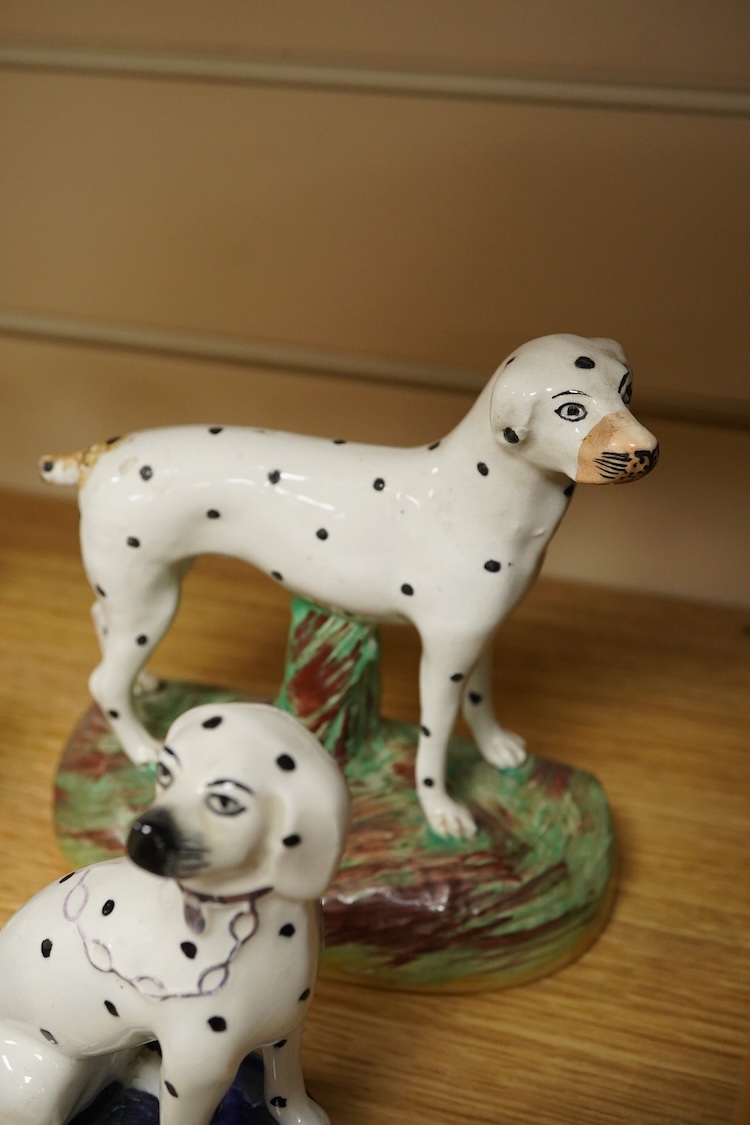 A collection of Beatrix Potter figures, three Staffordshire Dalmatians and a Copenhagen Dalmatian, tallest 16cm high
